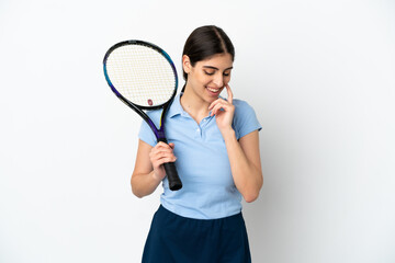 Handsome young tennis player caucasian woman isolated on white background laughing