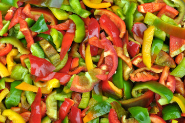 Multicolored vegetable background with bell peppers
