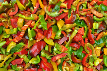 Multicolored vegetable background with bell peppers