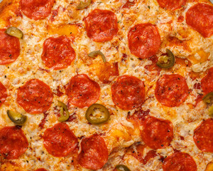 delicious pizza close-up. food texture, background for design.