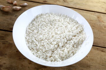 Plate of rice on table