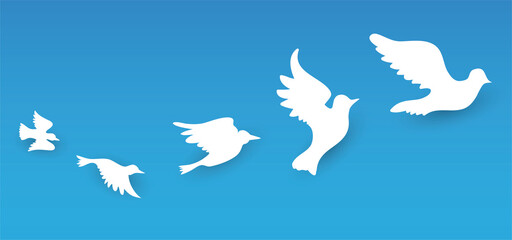 Fototapeta premium White doves flying silhouettes over blue sky, Vector illustration