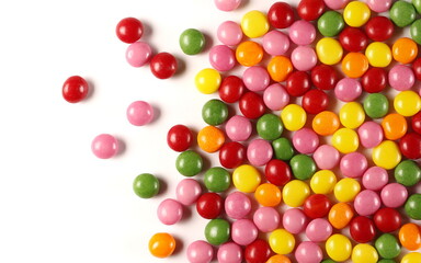 Obraz premium Colorful candies isolated on white background, top view