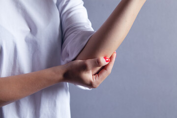 a young girl's arm hurts
