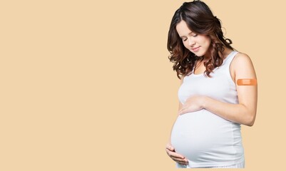 Adhesive Bandage on a young pregnant woman