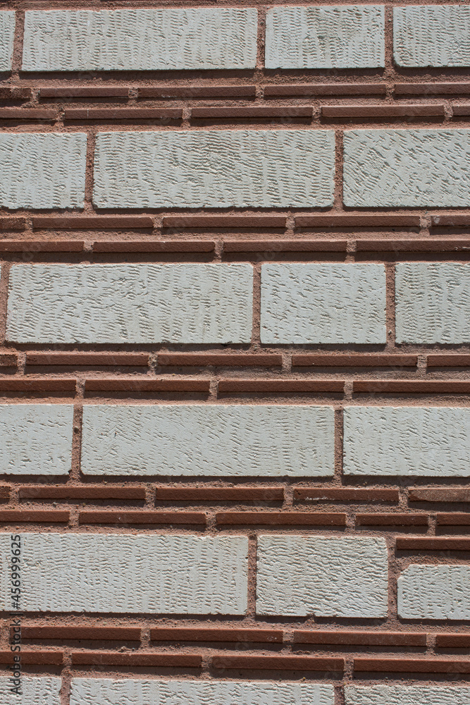 Poster vertical shot of a wall surface as a simple grunge background texture pattern