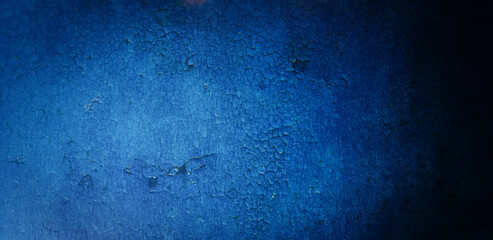 Painted with blue old collapsed paint metal surface.