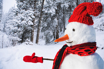 isolated snowman in red hat