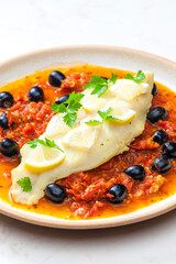 cod on tomato sauce with black olives