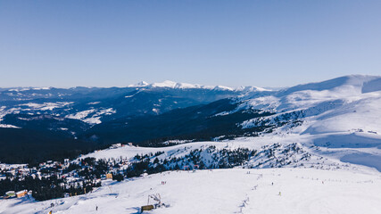 Fototapeta na wymiar panoramic view of winter snowed mountains
