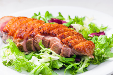 roasted duck breast with green salad