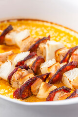 skewers with meat, bacon and onion