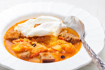 cabbage soup with poached egg