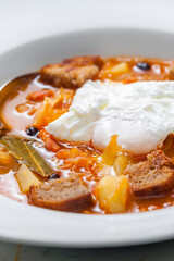 cabbage soup with poached egg