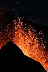 Eruption at Fagradalsfjall, Iceland. Red and orange incandescent lava is erupted from the volcanic...