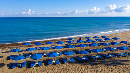 Amazing beach with umbrellas, Crete island, Greece. © sola_sola