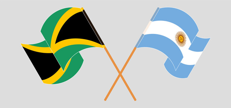 Crossed and waving flags of Jamaica and Argentina