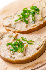 cracklings spread on bread with spring onion