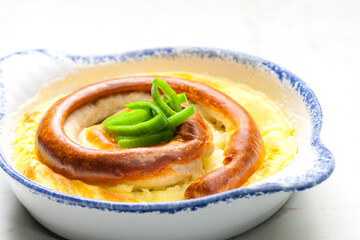 sausage baked with mashed potatoes