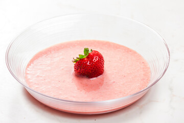 still life of summer strawberry soup