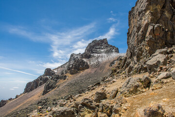 Fototapeta na wymiar Rocks in the mountain above the road