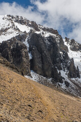 Walking up the mountain with snow
