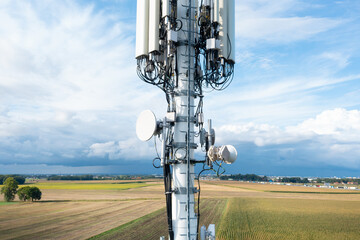 Antenna cellular 4g, 5g against the blue sky, close-up