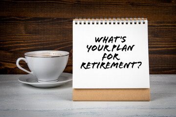 What's Your Plan for Retirement. Coffee cup on a wooden table