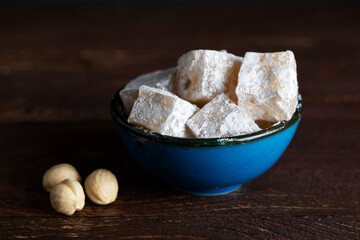 Tea in a glass with Turkish sweets in the
