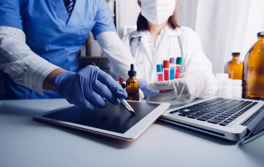 medical technology or medical network. doctor using digital tablet with screen interface.