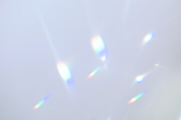 Blurred rainbow light refraction texture overlay effect for photo and mockups. Organic drop...