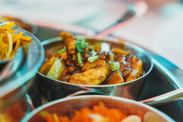 Meat thali served in a restaurant.