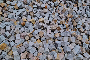 View of small cement bricks, wall texture, background.