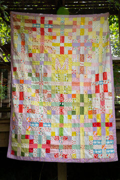 Handmade Quilt Hanging Outside