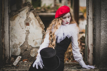 The girl with makeup of the mime. improvisation. Suit for Halloween. mime shows different emotions....