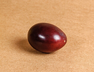 one plum on craft paper