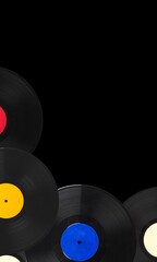 Multi colored vinyl records on a background. Retro or music concept