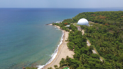 Landscape of the Domes Beach covered in greenery in Puerto Rico
