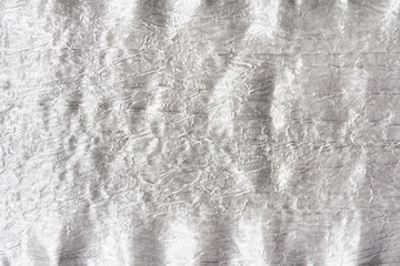 Texture backdrop photo of satin patterened cloth.