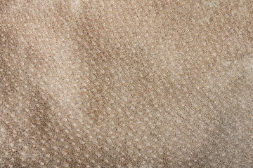 Brown colored suede material texture.