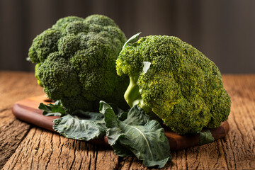 Green organic broccoli on the table.