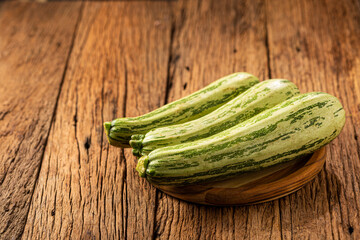 Green italian zuchini on the table.
