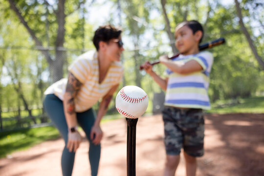 Close Up Of Baseball On Batting Tee