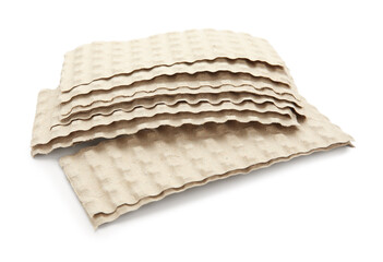 Pieces of cardboard on white background