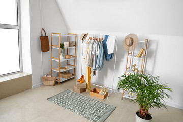 Interior of room with stylish clothes