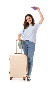 Young woman with luggage on white background. Concept of tourism