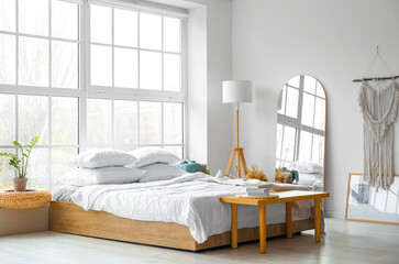 Interior of modern bedroom with mirror