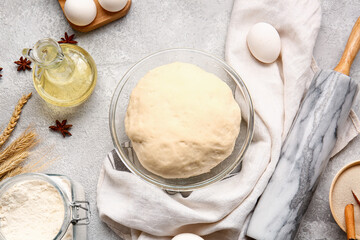 Composition with fresh dough on light background