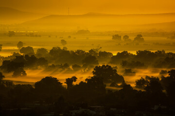 Sunrise landscape in Sinaloa, beautiful postcard with bright and wonderful yellow, ocher colors