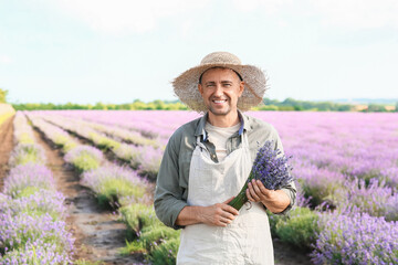 Farmer with beautiful bouquet in lavender field © Pixel-Shot